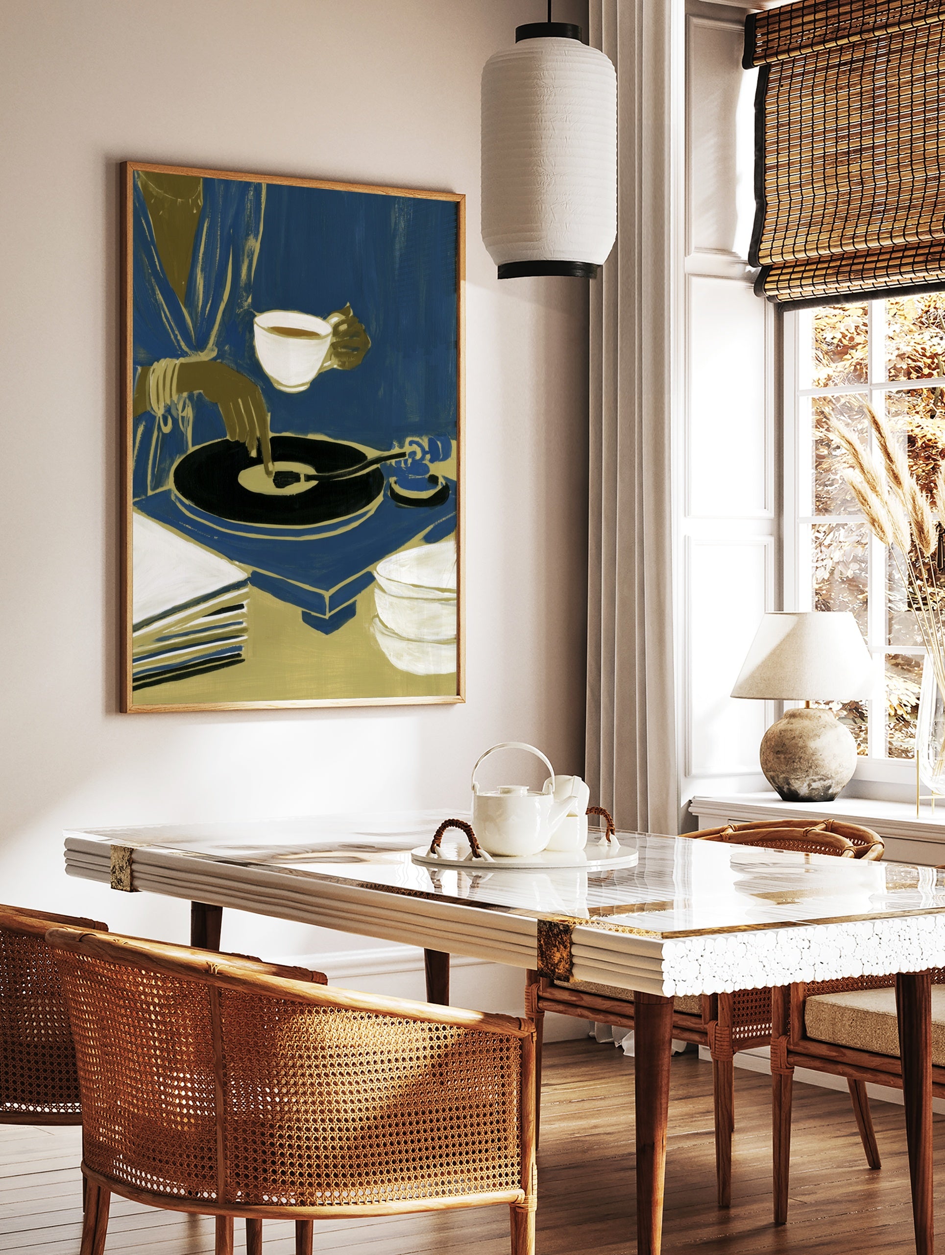 Modern illustration of a person with a teacup and vinyl record player in blue and gold tones on a, in a styled room mockup