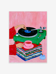 Illustration of a green vinyl record player, stacked records, and a pink teacup on a pink background