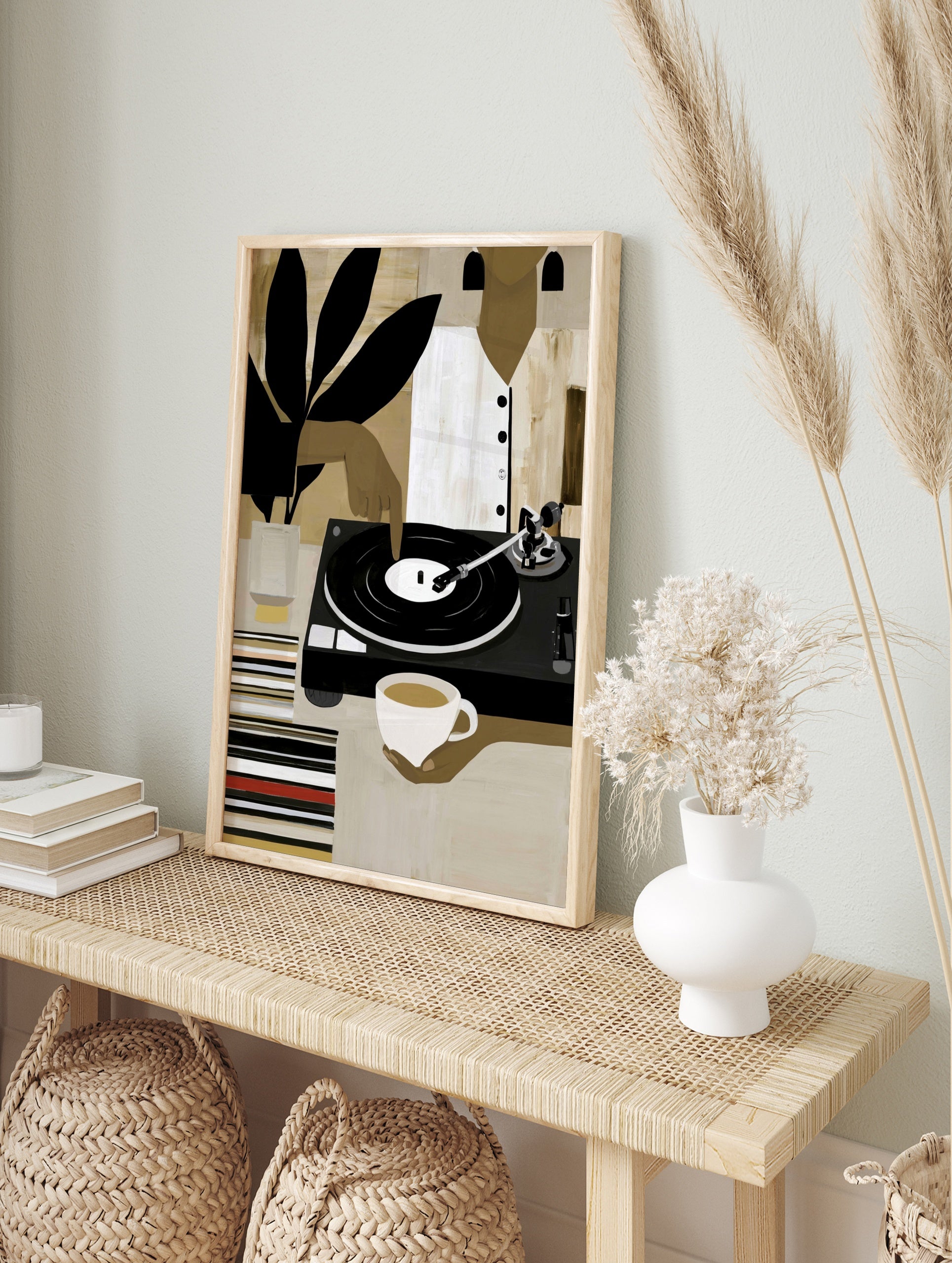 Modern illustrative wall art of a person with a vinyl record player, coffee, and plant, in an alternate framed mockup