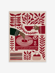 Stylised red and cream illustration of a hand playing a vinyl record, surrounded by botanical leaves and apples
