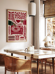 Stylised red and cream illustration of a hand playing a vinyl record, surrounded by botanical, in a styled room mockup