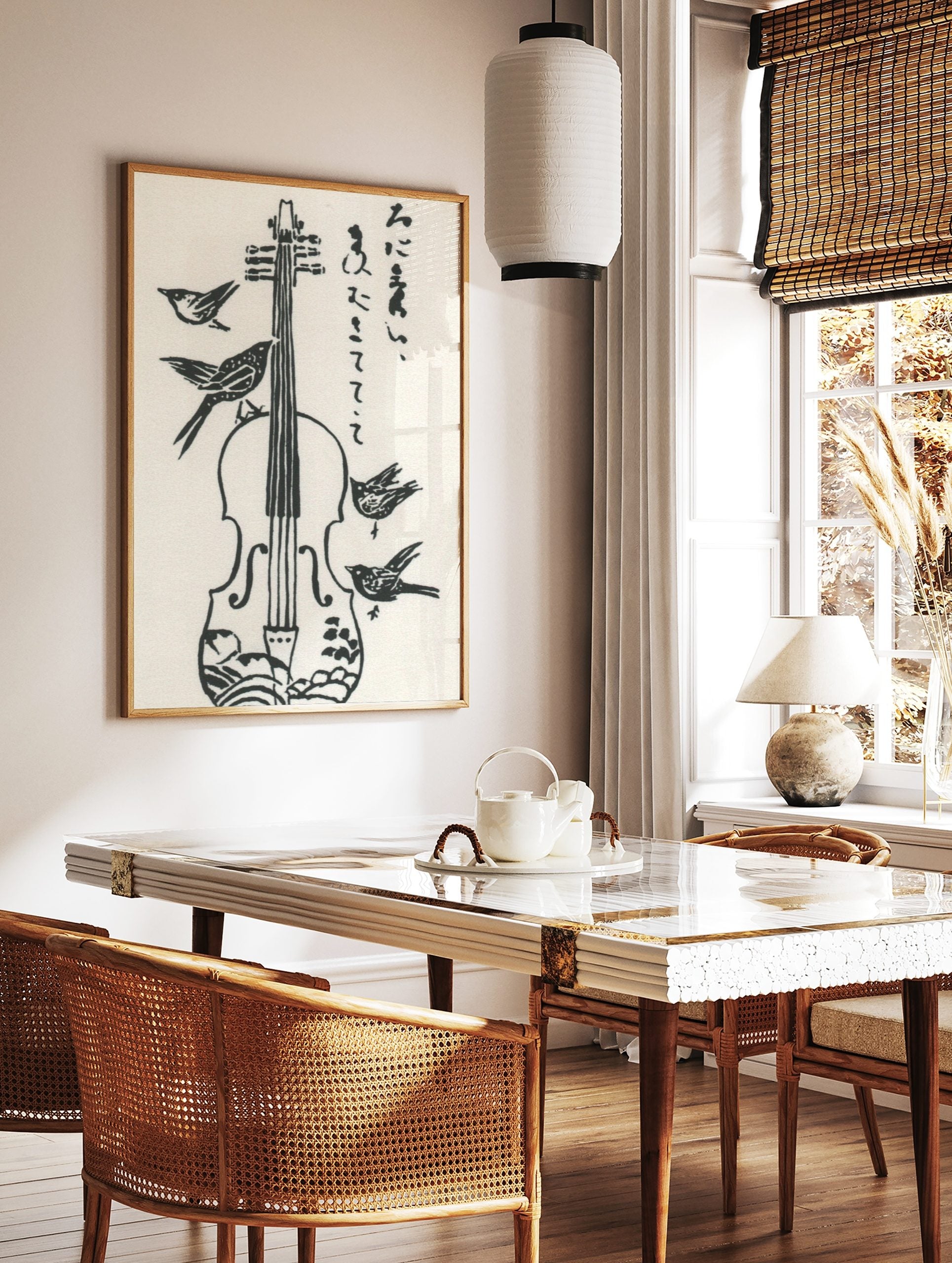 Black and white illustrative violin with four birds and Japanese calligraphy on white background, in a styled room mockup