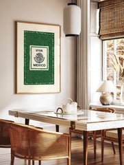 Viva Mexico wall art with Mexican eagle and snake emblem, 'VIVA MEXICO' text, green textured, in a styled room mockup