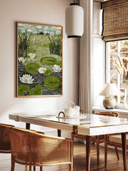 Linocut print of a pond with white water lilies, green lily pads, and tall reeds against a floral, in a styled room mockup