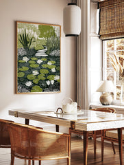 Illustrative green and white water lily pond print with stepping stone path and garden foliage, in a styled room mockup