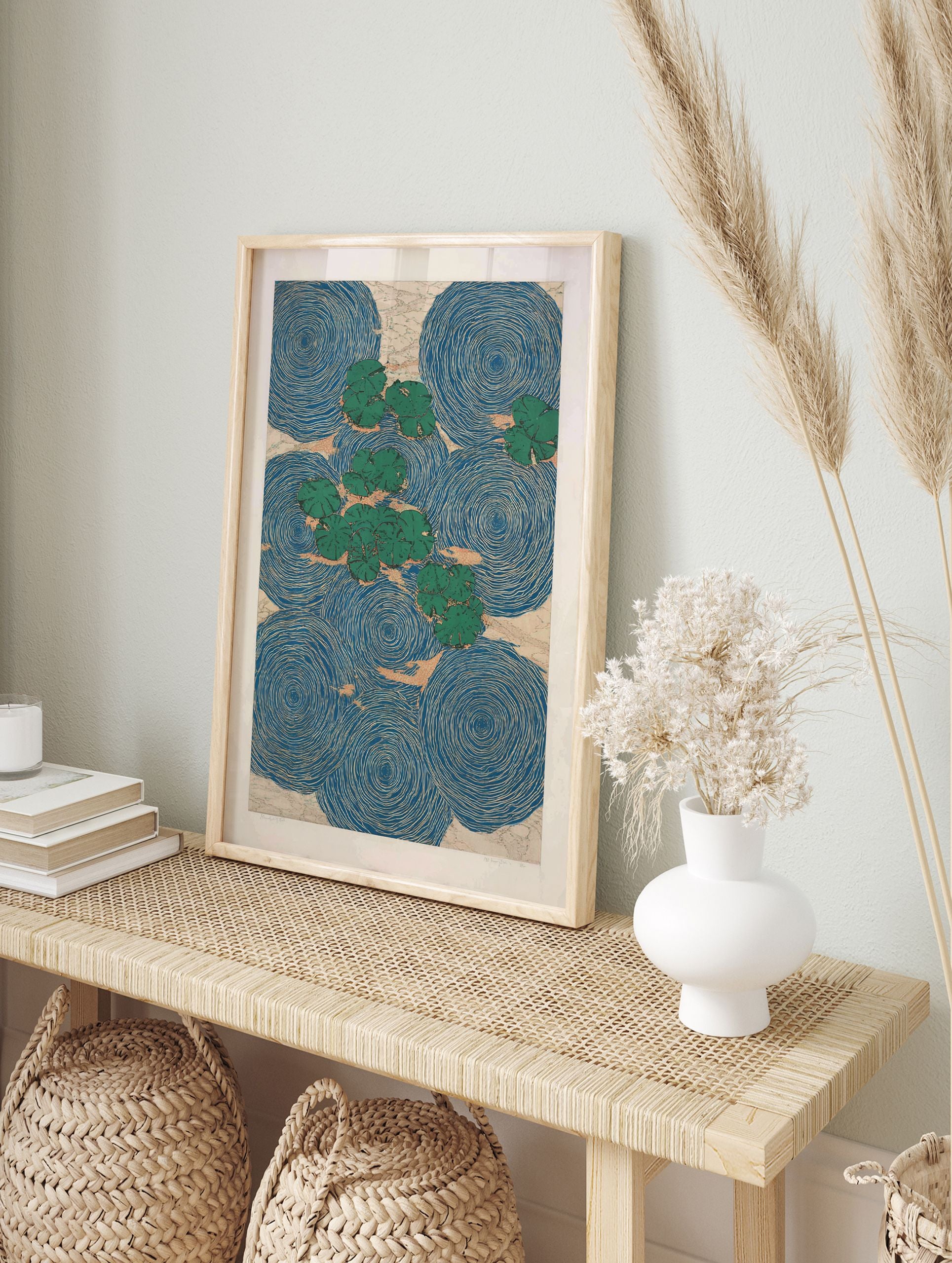 Water lily poster featuring green lily pads floating on blue water with concentric ripple patterns and beige background texture. - Image 4