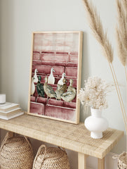 Watercolour illustration of multiple ducks (white, brown, green-headed) sitting in rows on, in an alternate framed mockup