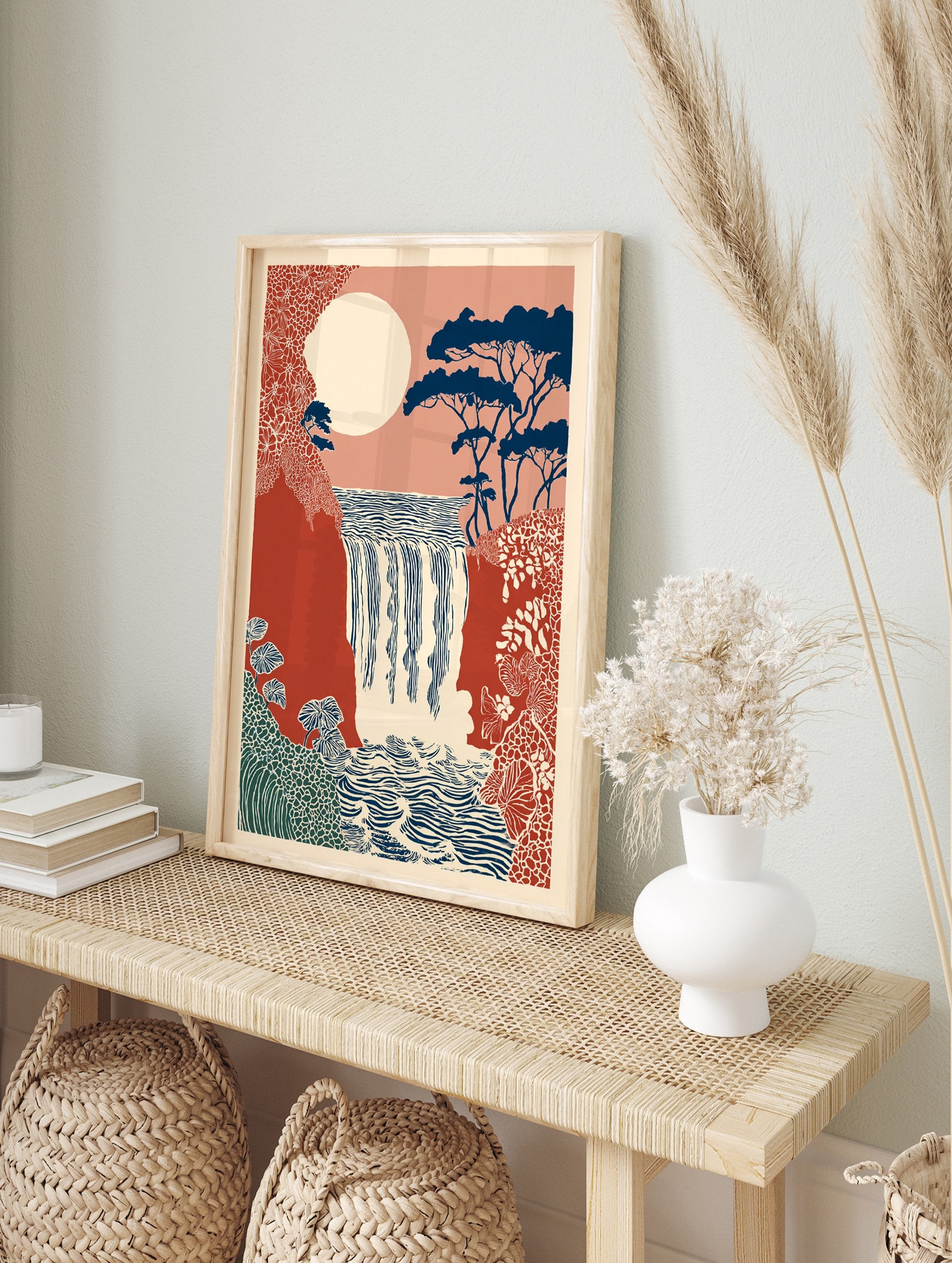 Stylized waterfall wall art print with a large moon, dark blue trees, red cliffs, and patterned foliage in a natural landscape. - Image 3