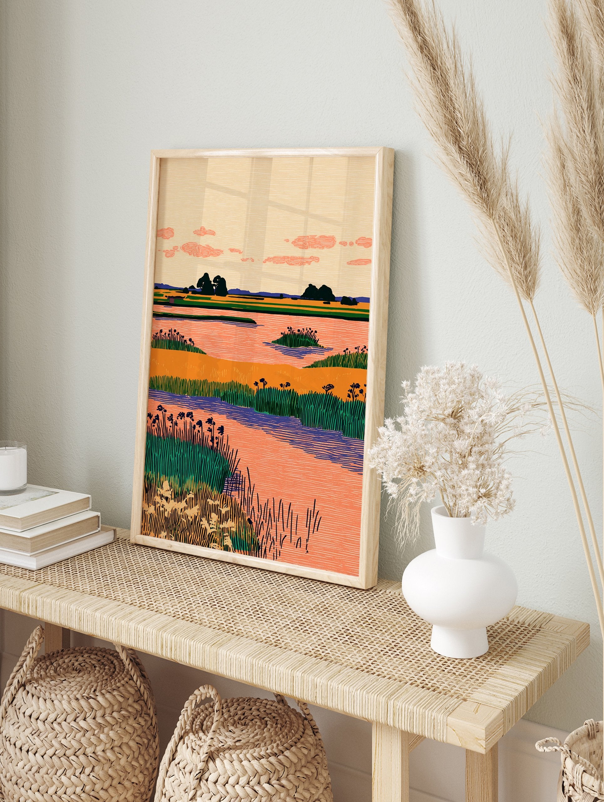 Stylized wetland landscape wall art with orange water, green reeds, dark trees, and a peach sky with pink clouds. - Image 3