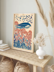 Blue whale swimming over coral flowers and blue foliage with birds in the sky, illustrative wall art - Image 3