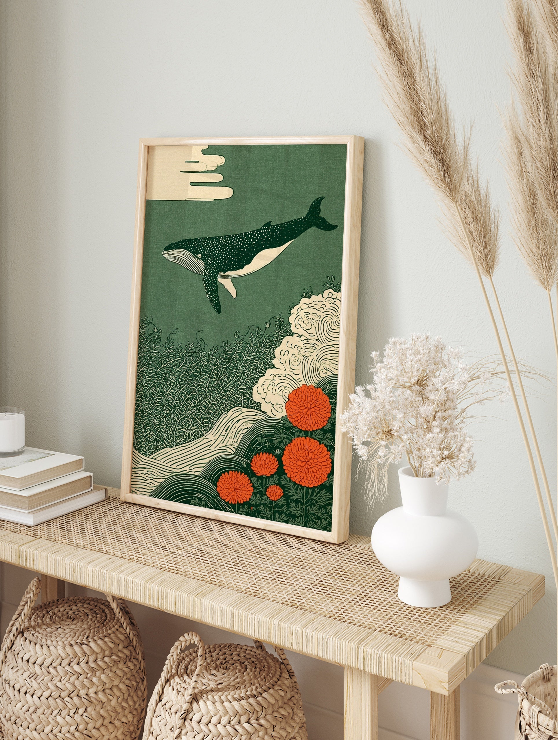 Japanese style art print of a spotted whale swimming above seaweed and orange chrysanthemum, in an alternate framed mockup