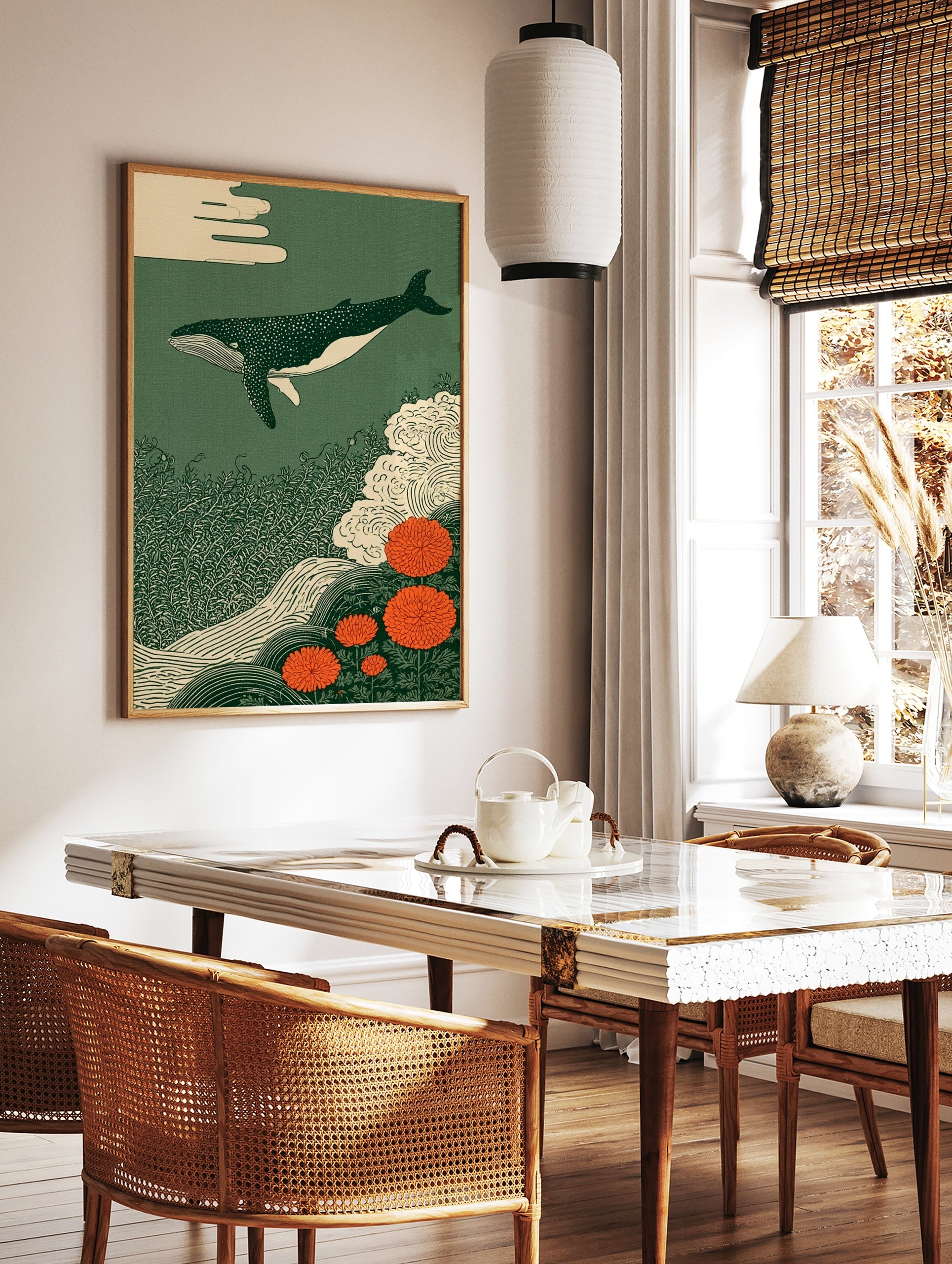Japanese style art print of a spotted whale swimming above seaweed and orange chrysanthemum flowers, in a styled room mockup