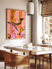 Painterly whale illustration swimming among seaweed and flowers in pink and orange tones, wall art, in a styled room mockup