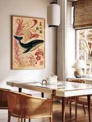 Japanese-style whale art print with red flowers, calligraphy, and swirling wave patterns on a tan, in a styled room mockup