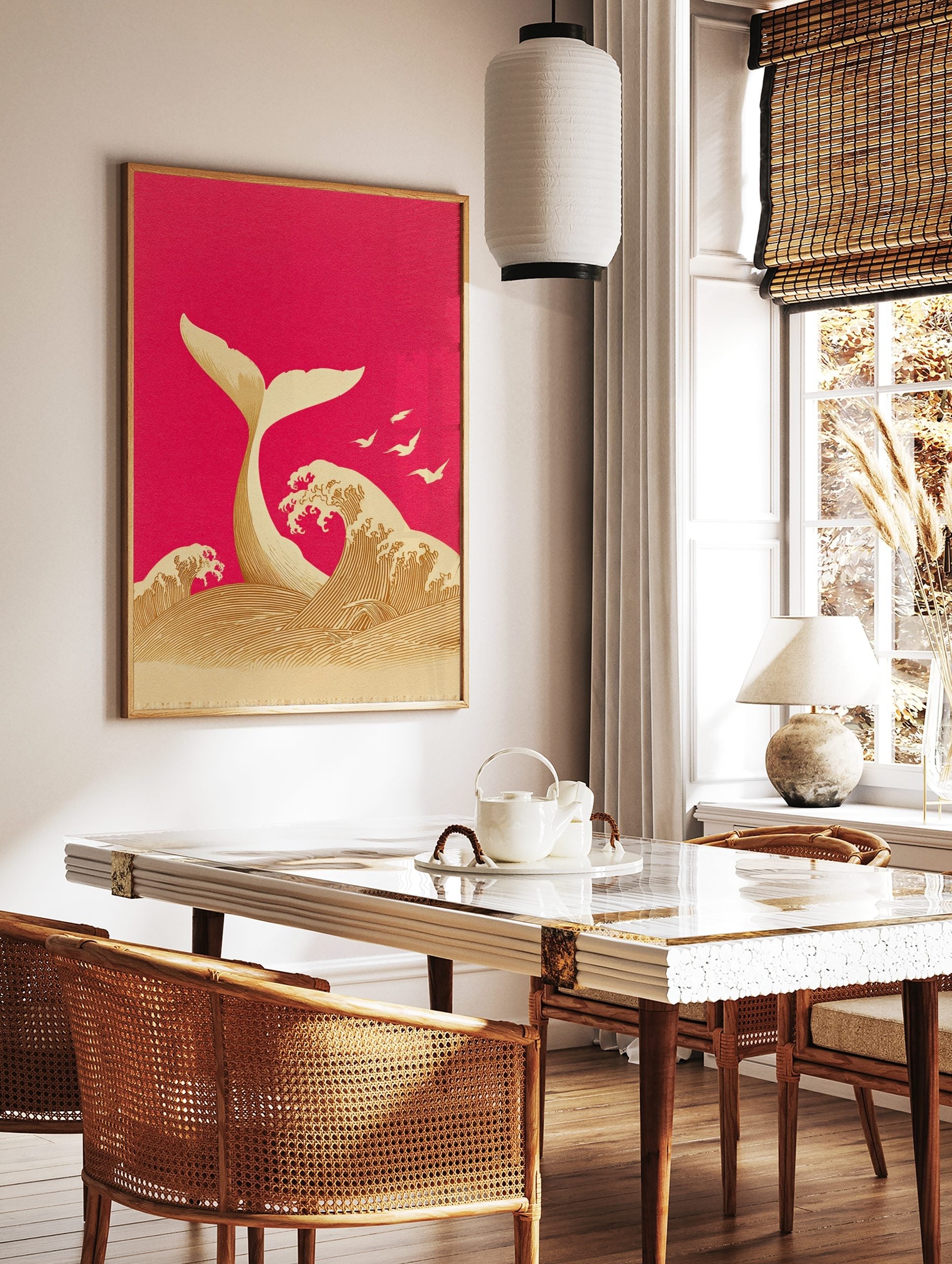 Illustrative whale tail emerging from ocean waves with birds on magenta background, in a styled room mockup