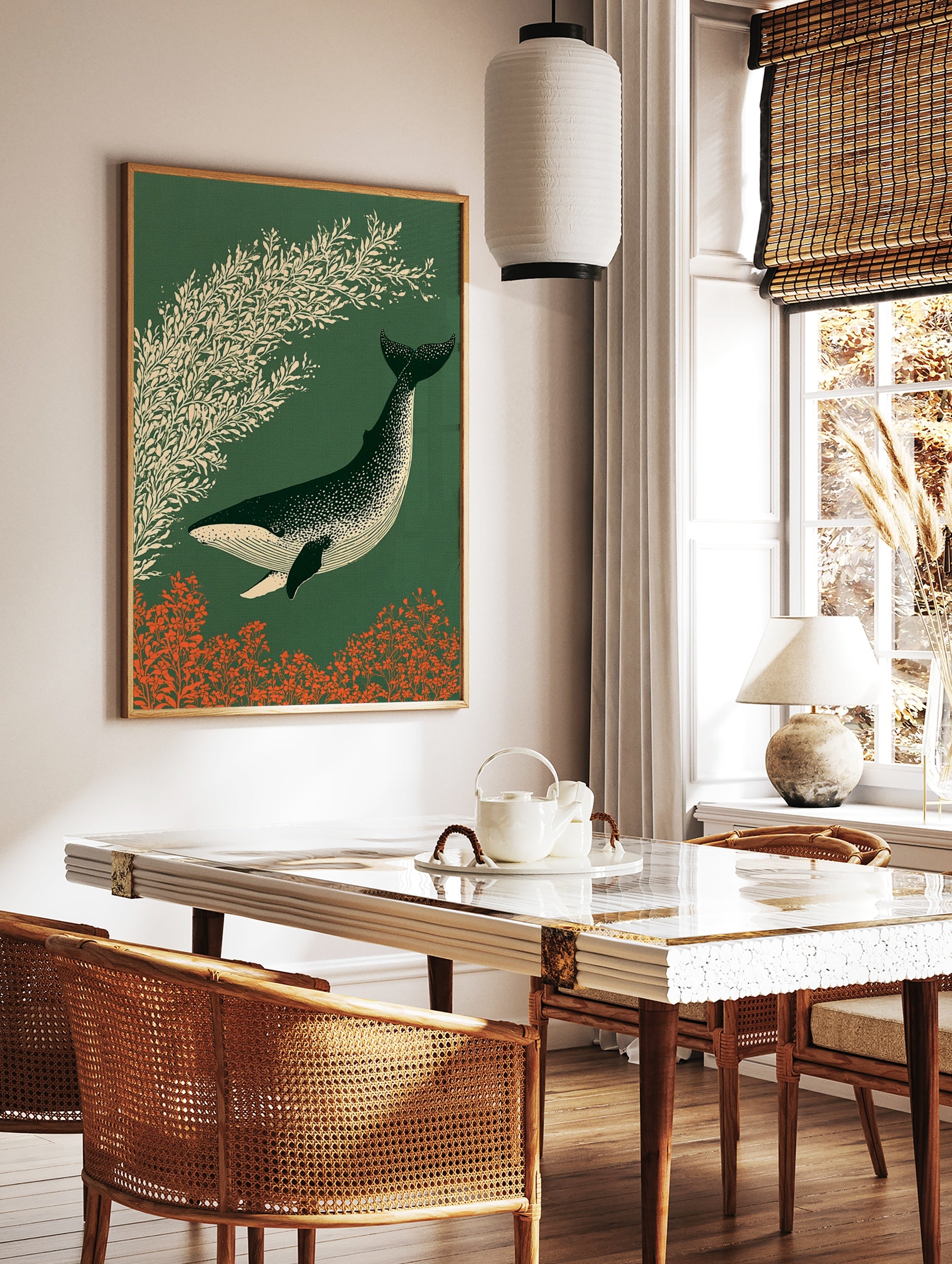 Stylized illustration of a speckled whale swimming past cream foliage on a dark green background, in a styled room mockup