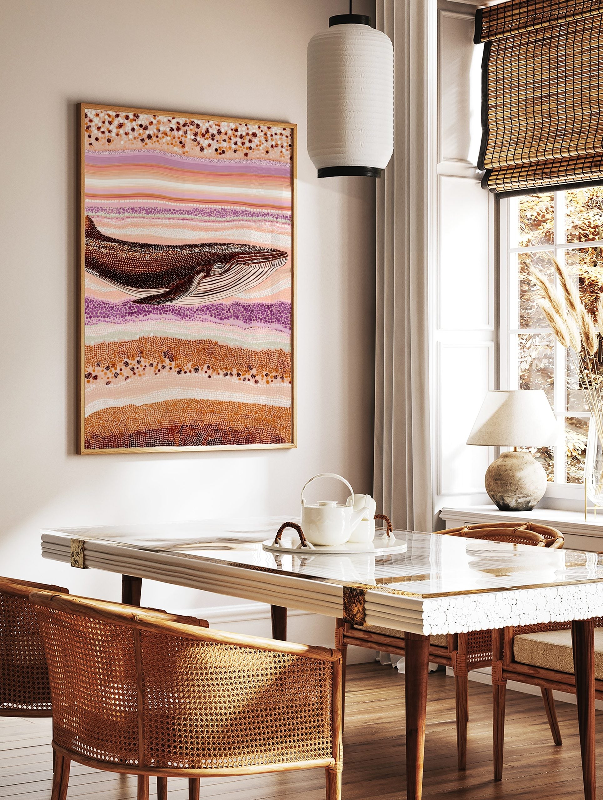 Whale art print in Aboriginal dot painting style with brown, orange, cream, and purple wavy patterns, in a styled room mockup