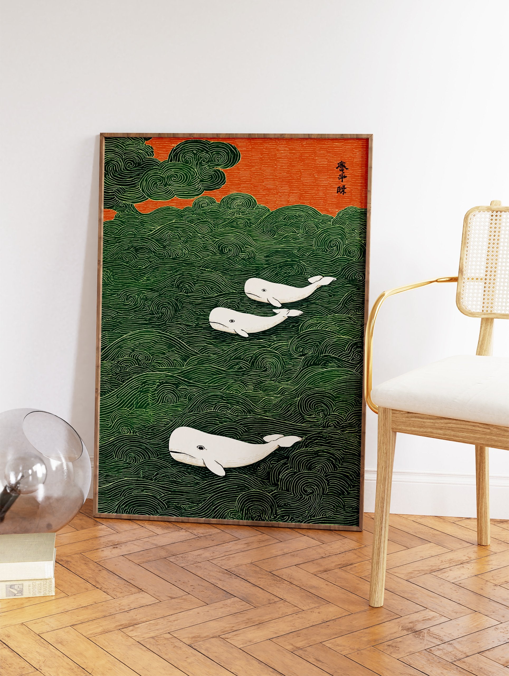 Three white whales swim in a stylized green wavy ocean under an orange sky, Japanese style whale wall art print. - Image 2