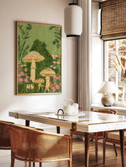 Whimsical illustration of tall speckled mushrooms, a small cottage, and pink flowers in lush green, in a styled room mockup
