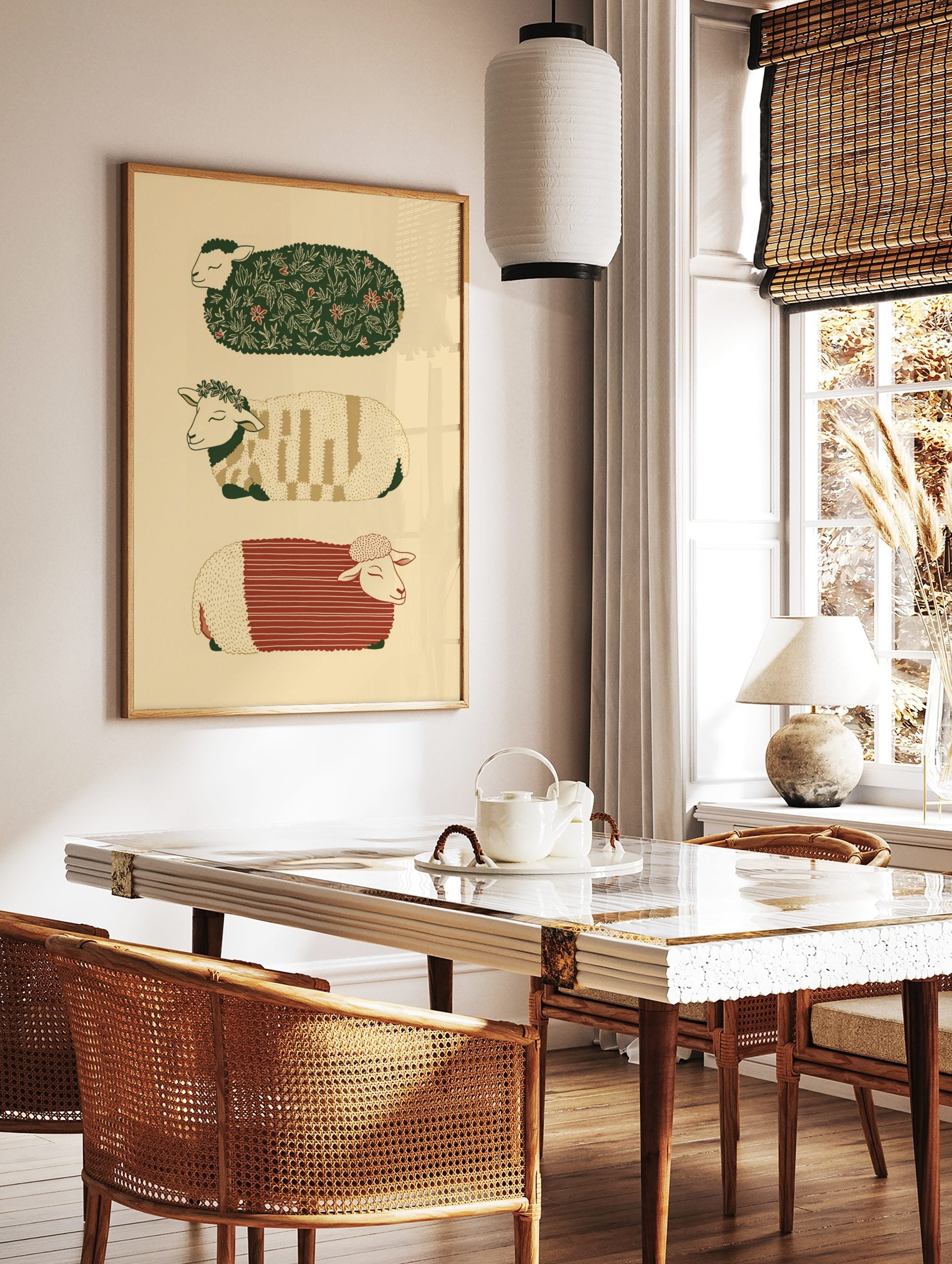 Three illustrative sheep with patterned fleeces in green, red, and beige, stacked vertically on a, in a styled room mockup