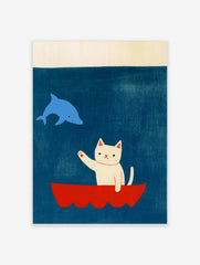 Illustrative art print featuring a white cat waving from a red boat at a blue dolphin against a deep blue background