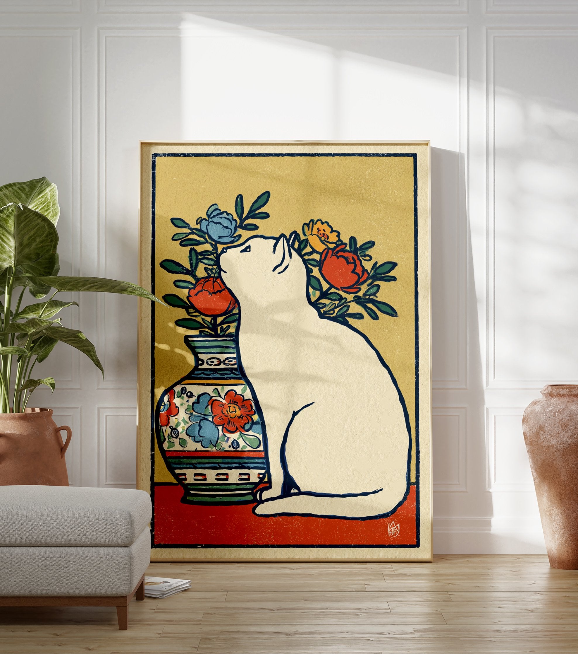 White cat wall art sitting next to a vase with red, blue, and yellow flowers in an illustrated, vintage style. - Image 3
