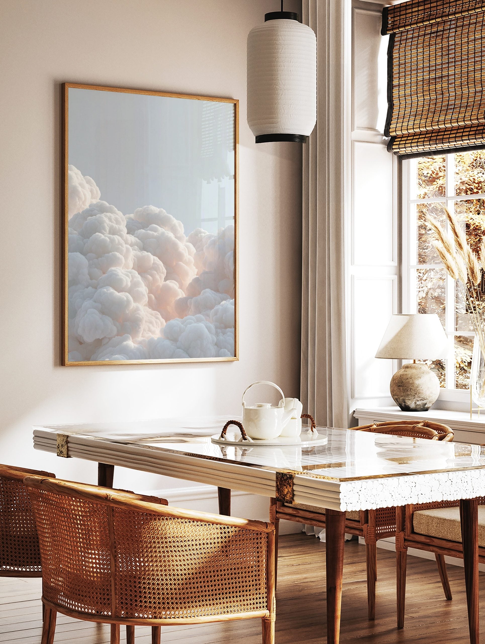Voluminous white clouds with soft, warm glow against a light blue sky, filling the bottom of the, in a styled room mockup