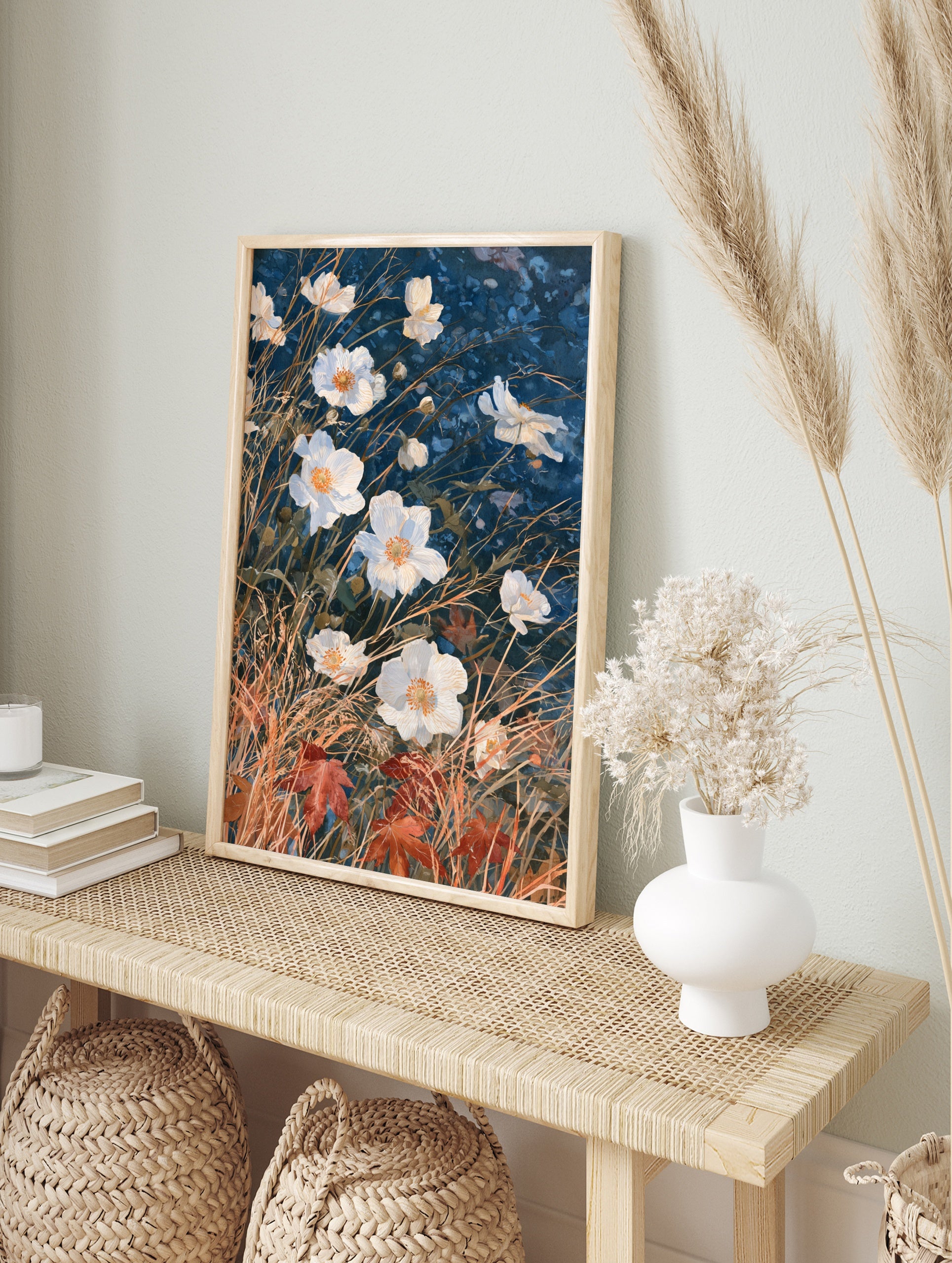 White flowers with golden grasses and red autumn leaves on a deep blue background botanical, in an alternate framed mockup