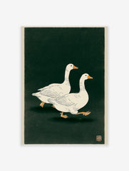Two white geese with orange beaks and feet walking on a dark green background in a Japanese illustrative print