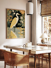 White heron bird with golden-yellow plumage in water, surrounded by dark green and orange botanical, in a styled room mockup