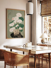 Japanese woodcut style illustration of white mushrooms with red accents and green leaves growing, in a styled room mockup