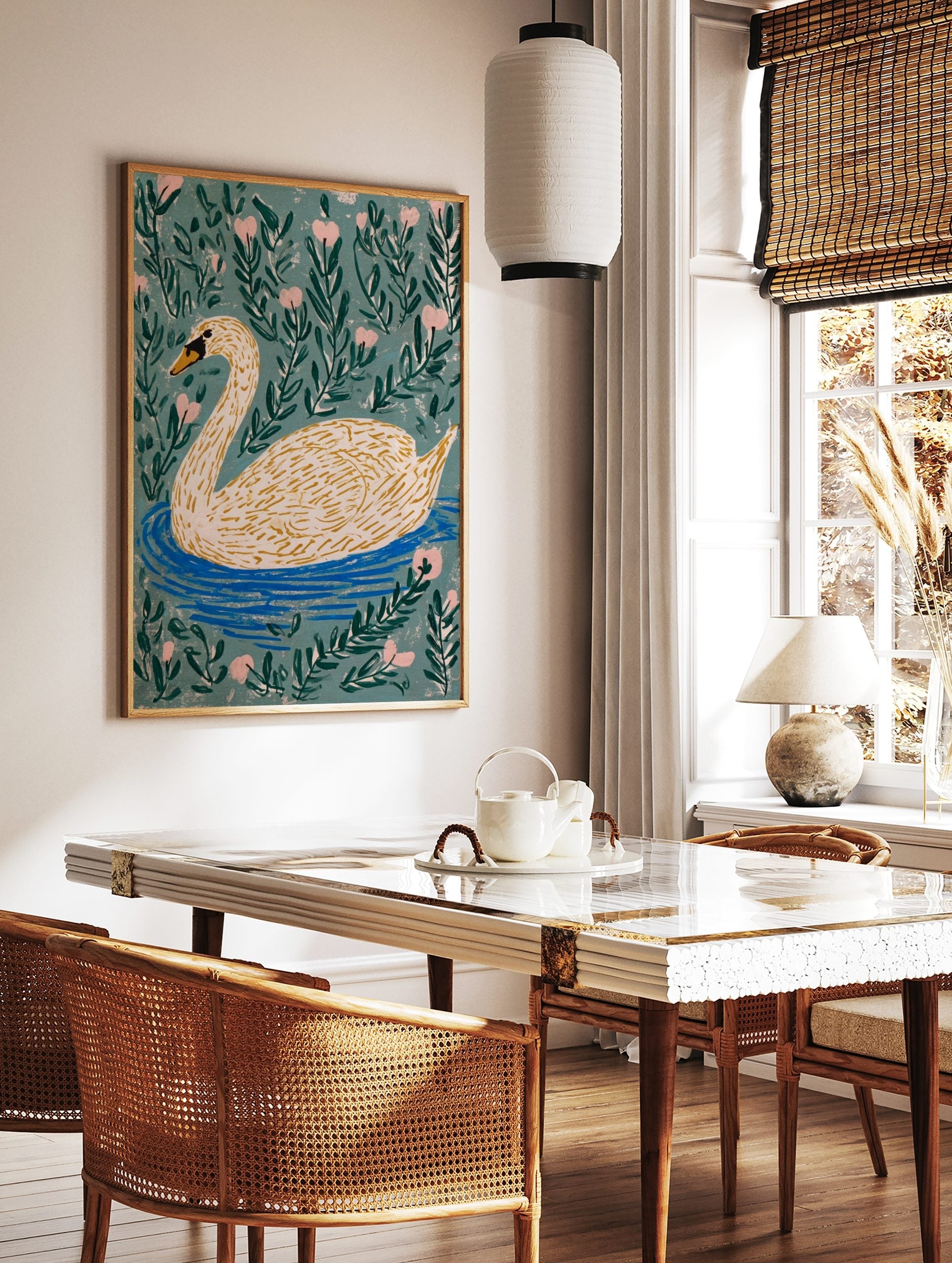 Illustrative white swan with orange beak swimming in blue water, surrounded by green leaves and, in a styled room mockup