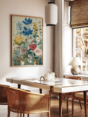 Wildflower garden art print with blue, yellow, red flowers, green leaves, and two chipmunks, in a styled room mockup