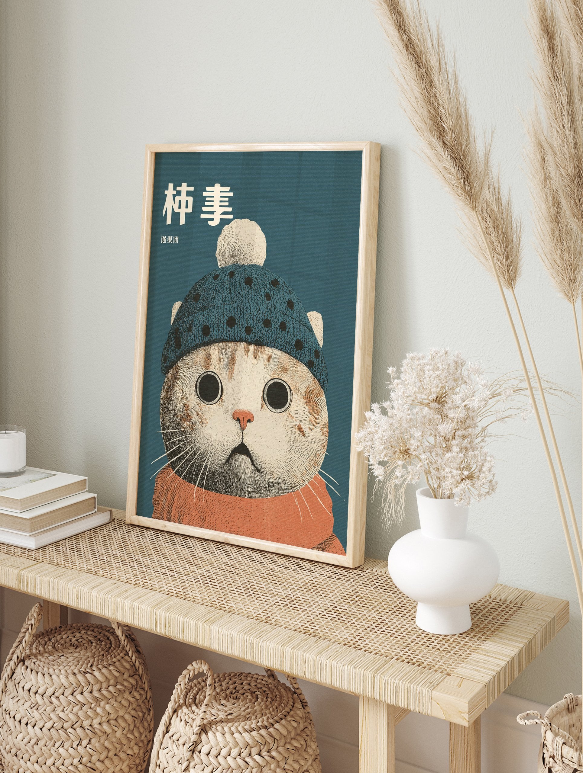 Illustrative Cat Wall Art print featuring a cat wearing a blue knitted hat with a pom-pom and an orange scarf on a teal background. - Image 3