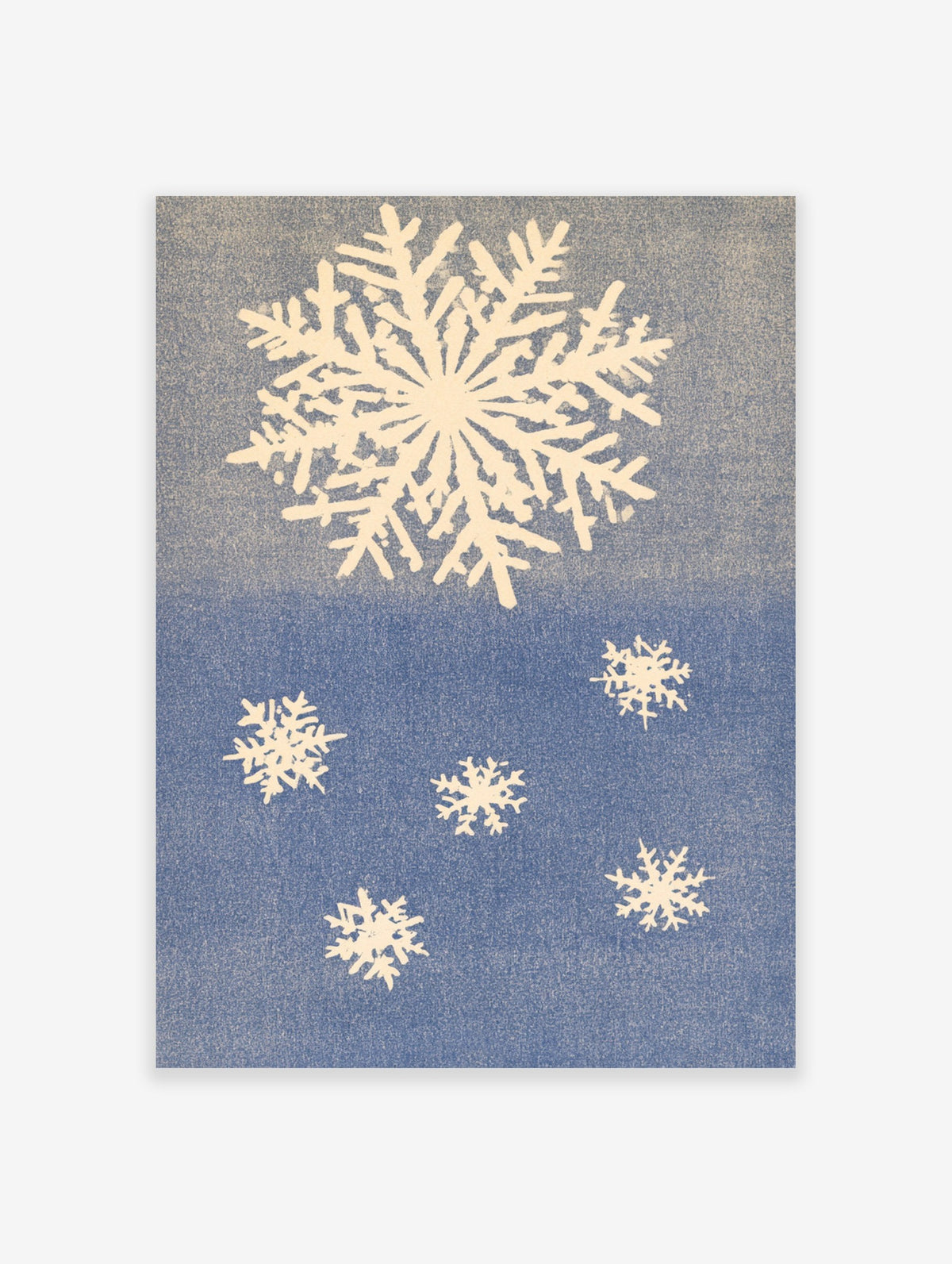 Winter snowflake wall art with a large central crystal and smaller snowflakes on a textured blue background