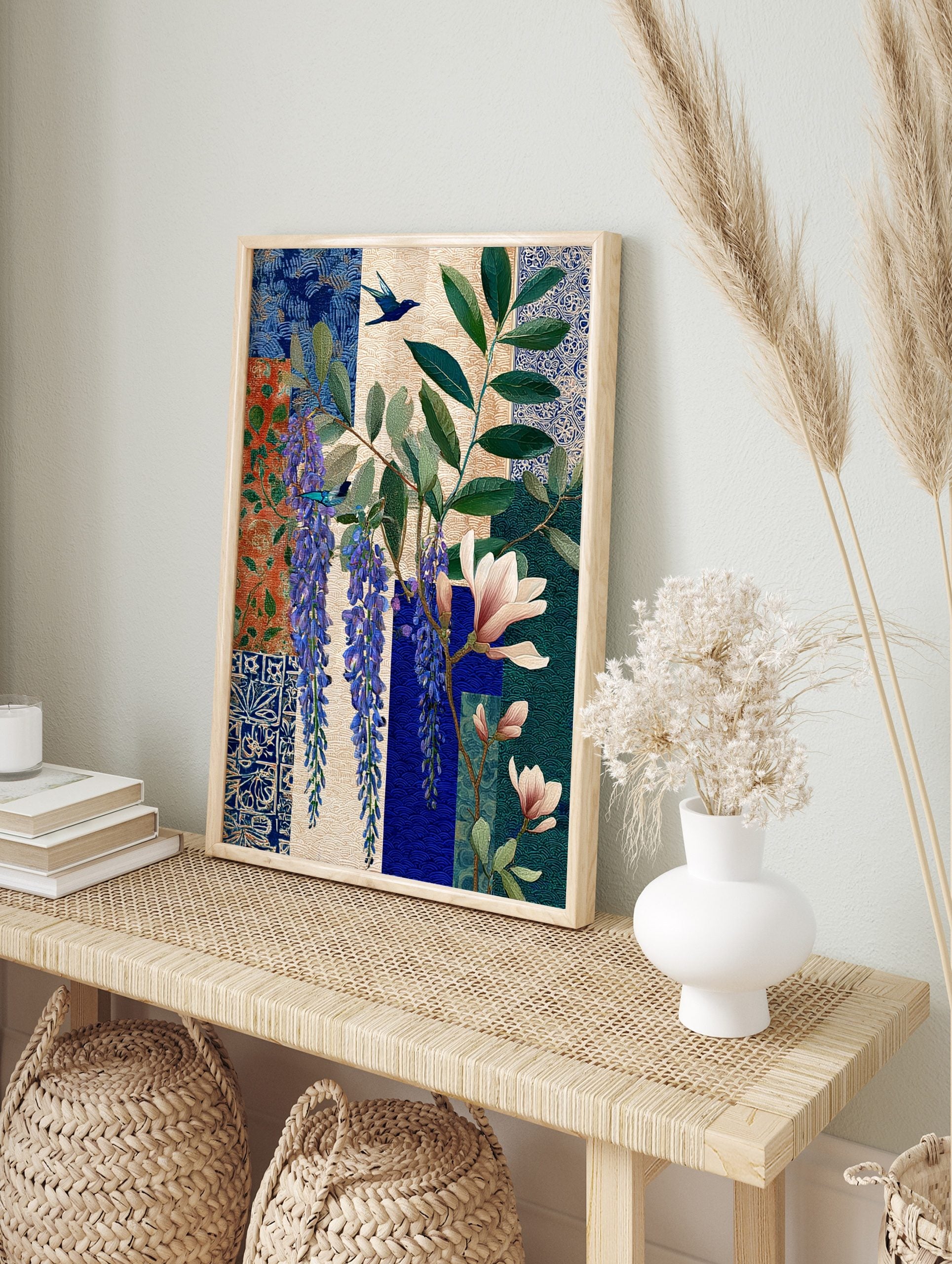 Botanical art print with purple wisteria, pink magnolia, green leaves, and two blue birds on, in an alternate framed mockup