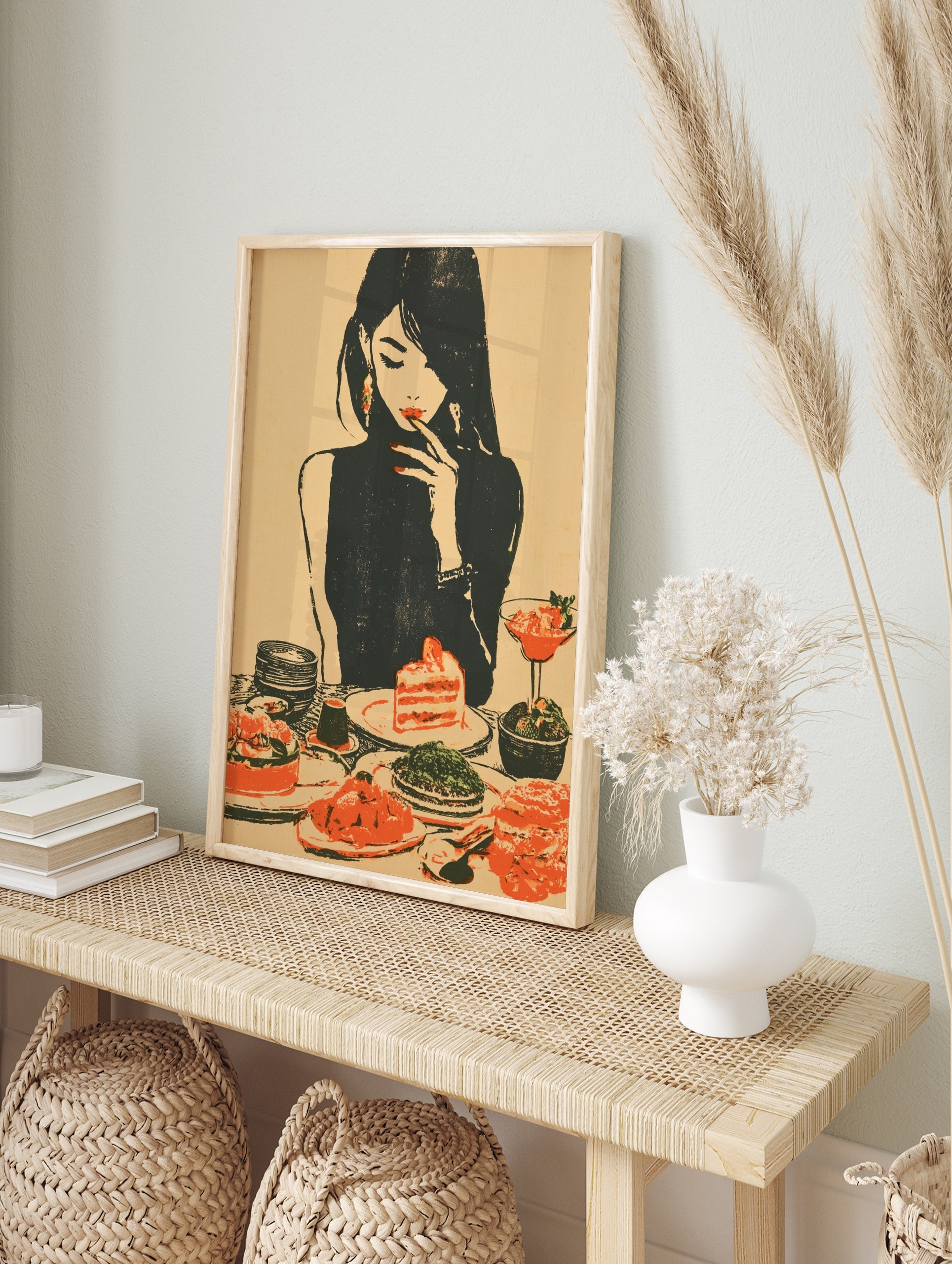 Retro illustration of a woman in a black turtleneck eating strawberry cake with a table full, in an alternate framed mockup
