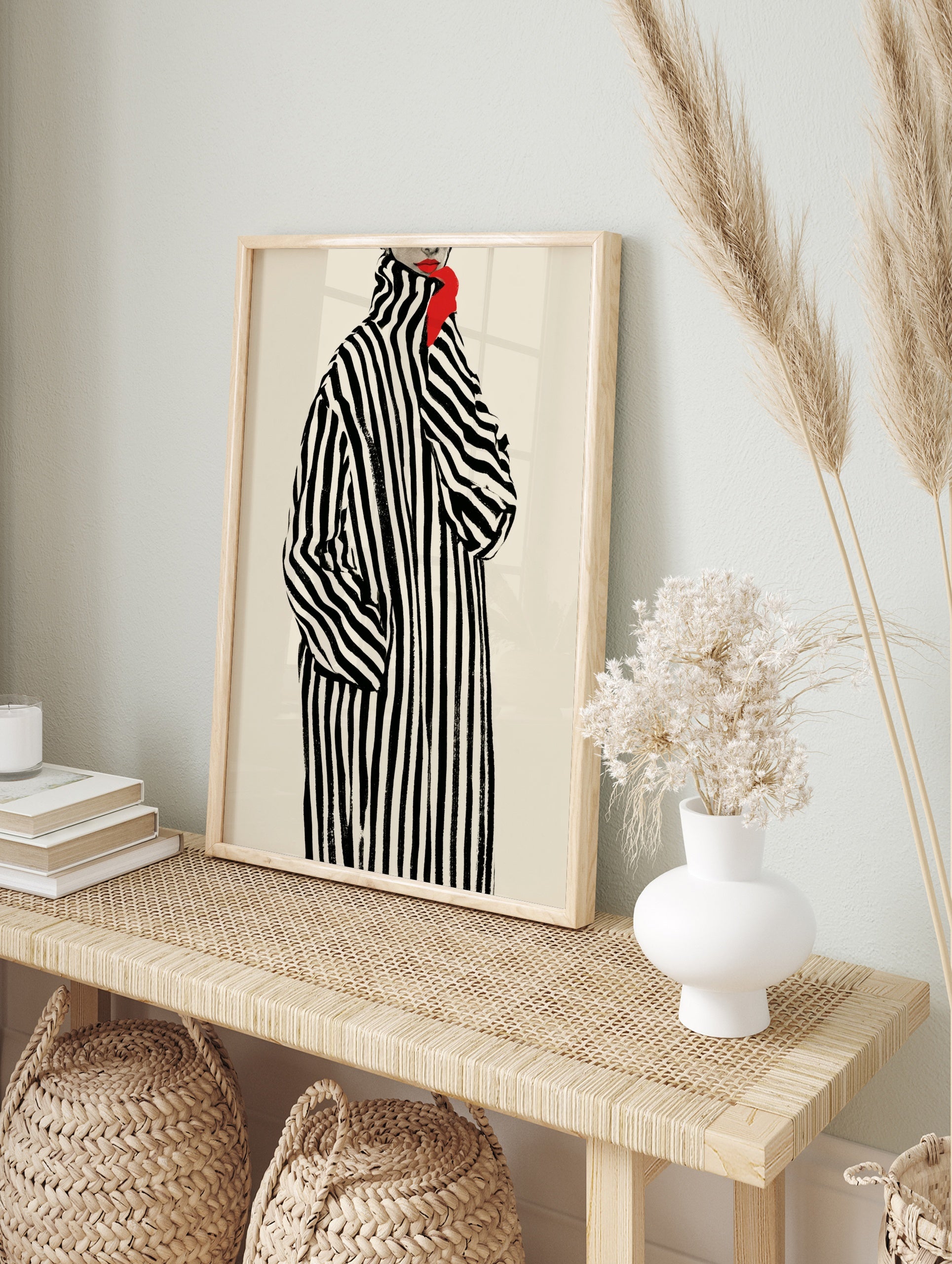 Fashion illustration of a woman in a black and white striped coat with red lips and a bright, in an alternate framed mockup