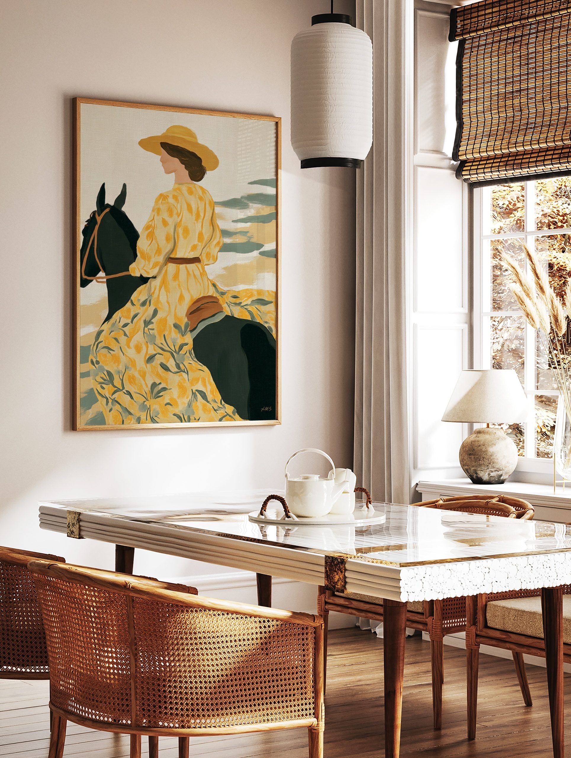 Illustrative art print of a woman in a yellow floral dress and hat riding a dark horse, looking, in a styled room mockup