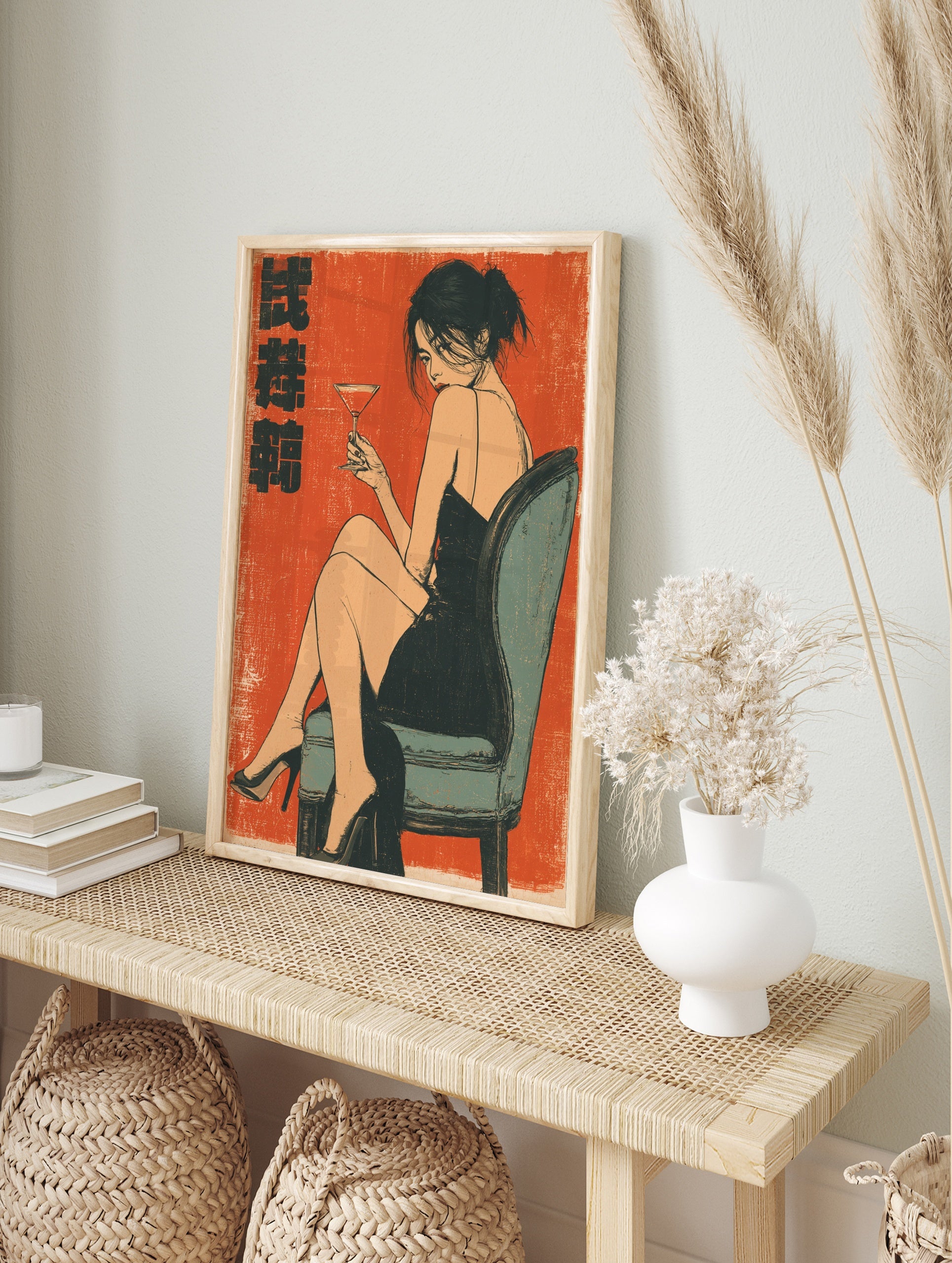 Retro illustration of a woman in a black dress holding a martini glass on a vibrant orange, in an alternate framed mockup