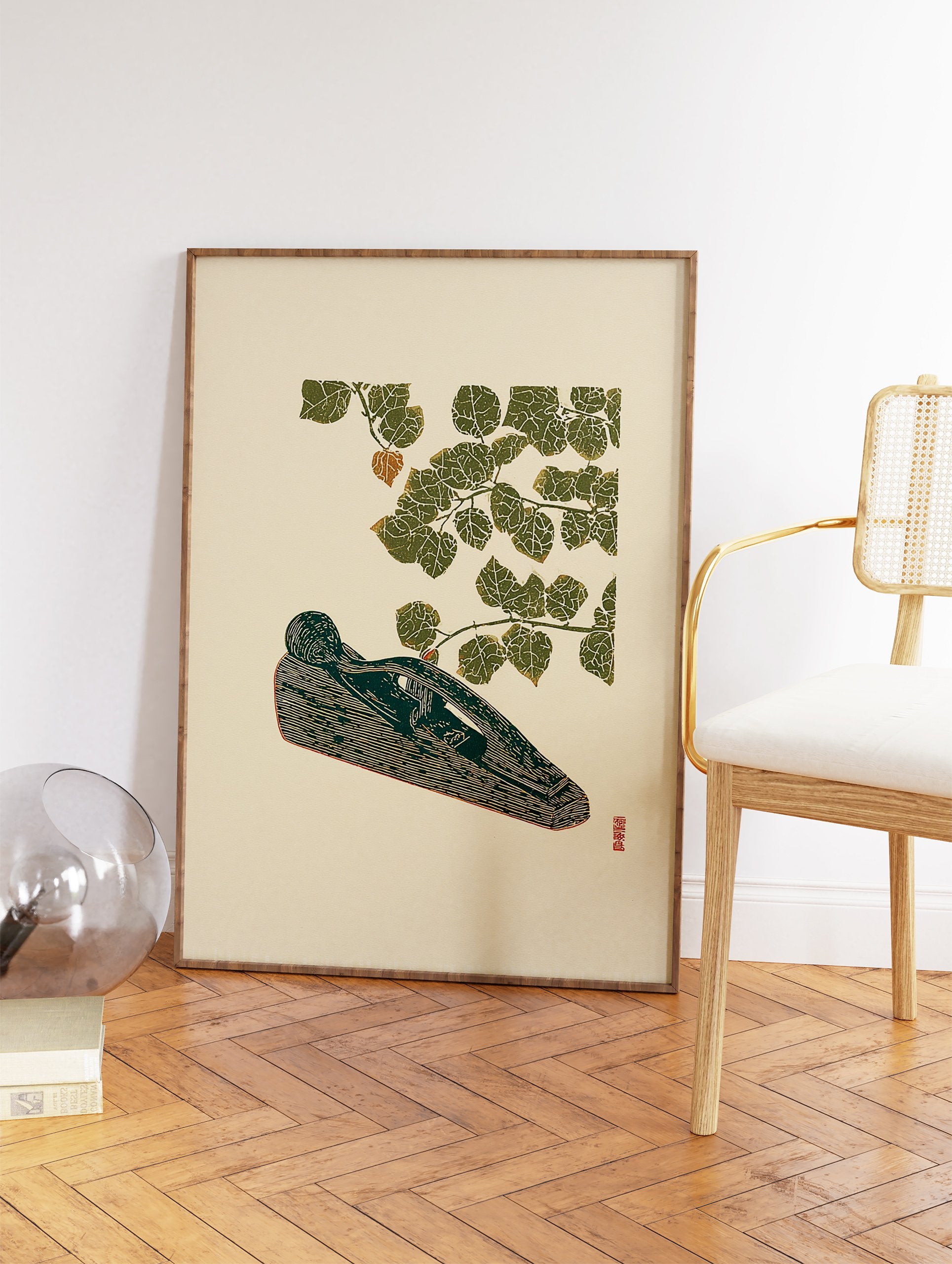 Woodcut art print depicting a green woodworking plane under a branch with green leaves and a red berry on a cream background. - Image 2
