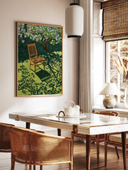 Wooden chair resting on green grass under a blooming white tree, casting dappled shadows on the lawn, in a styled room mockup