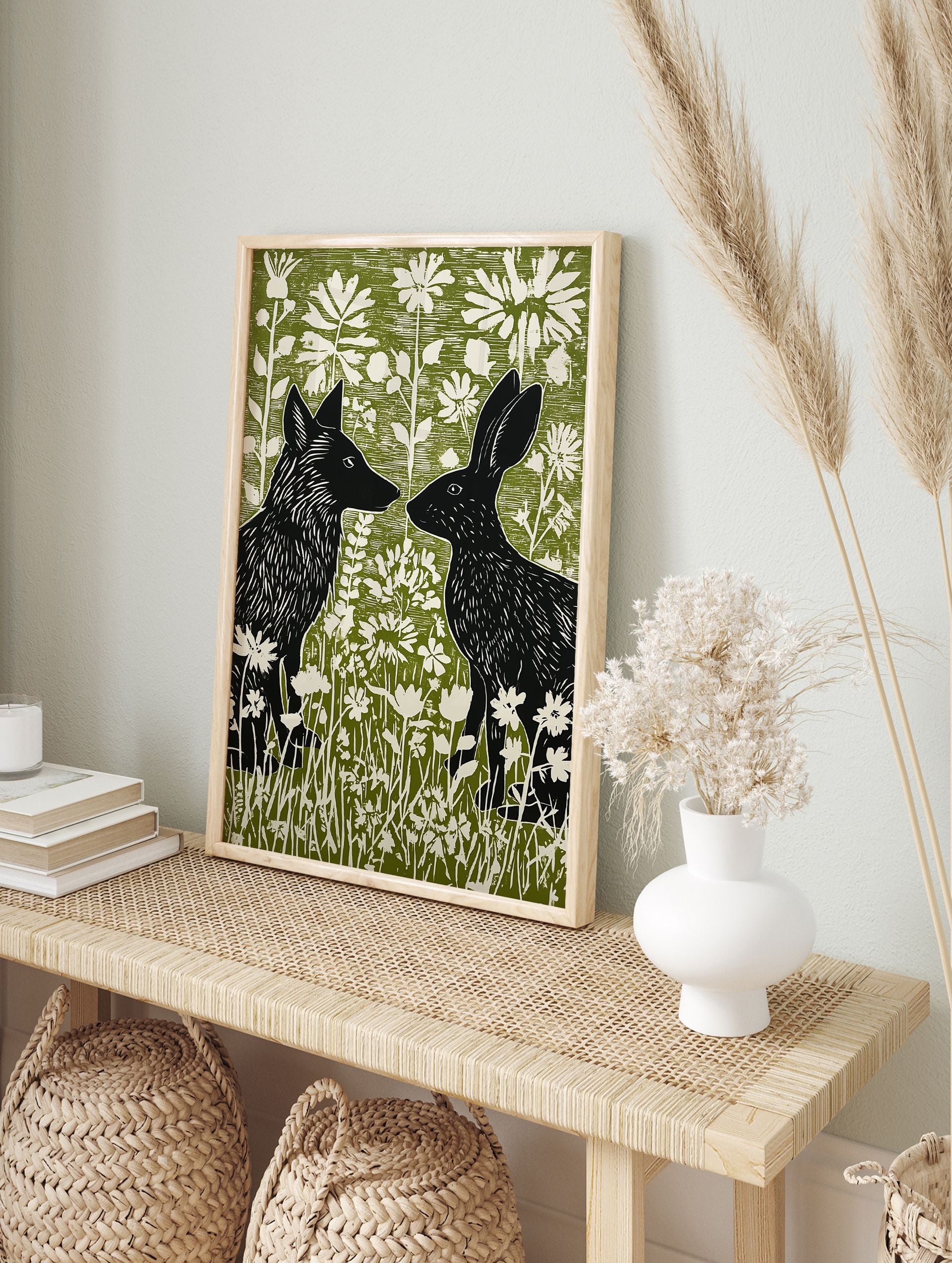 Black fox and rabbit facing each other in a green and white linocut style woodland animal wall art print with flowers. - Image 3