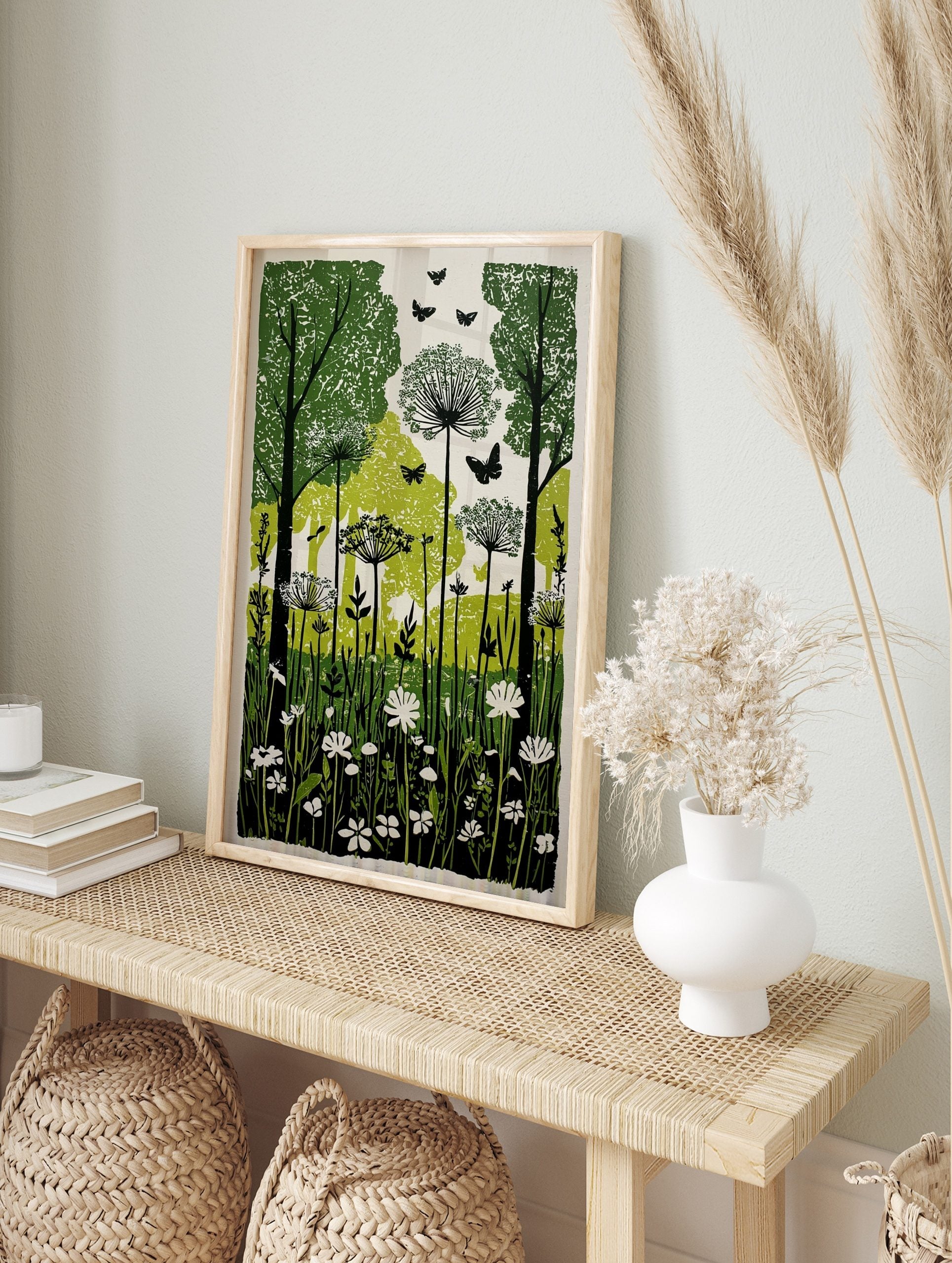 Illustrative green and white woodland forest art print with trees, botanical flowers, and, in an alternate framed mockup