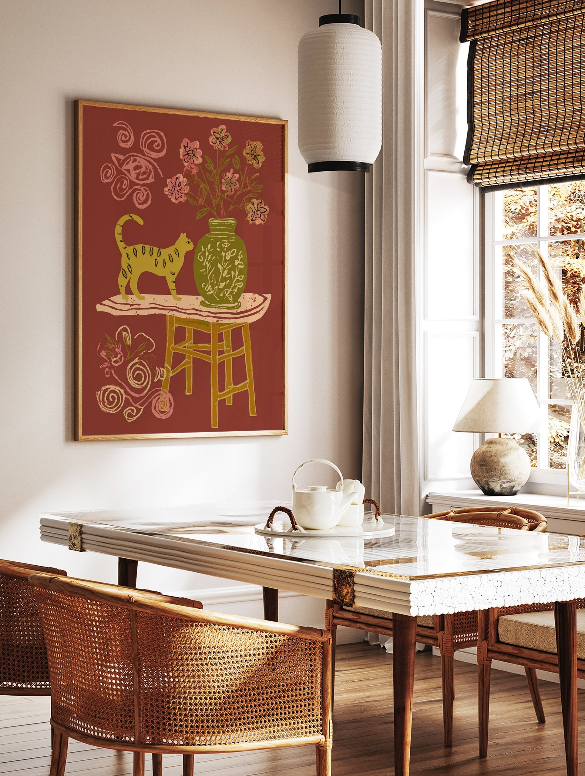 Yellow cat wall art illustration with a green vase, pink flowers, and a table on a reddish-brown background. - Image 2