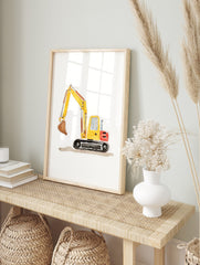 Yellow excavator watercolour illustration print with a brown bucket and black tracks on a, in an alternate framed mockup