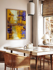 Abstract painting with bold yellow and deep purple textured brushstrokes, accented with white and, in a styled room mockup